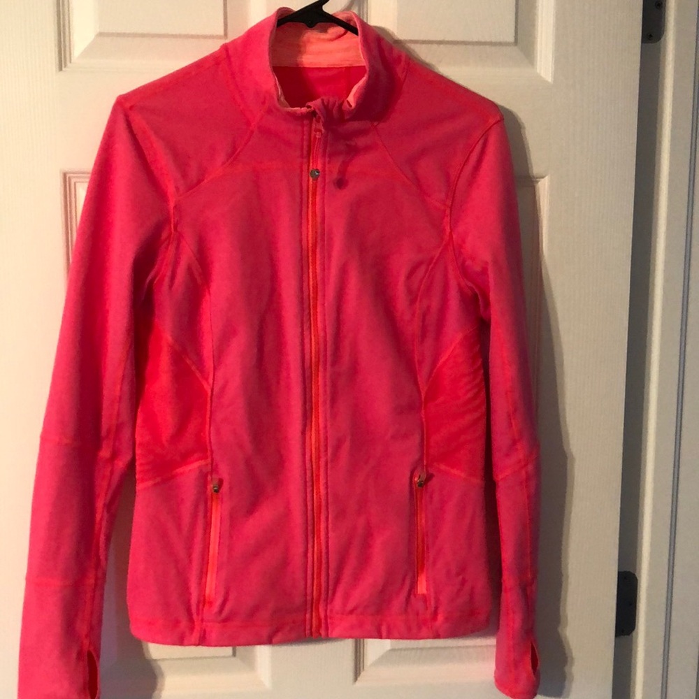 Sport jacket with zip front and two zip front pockets